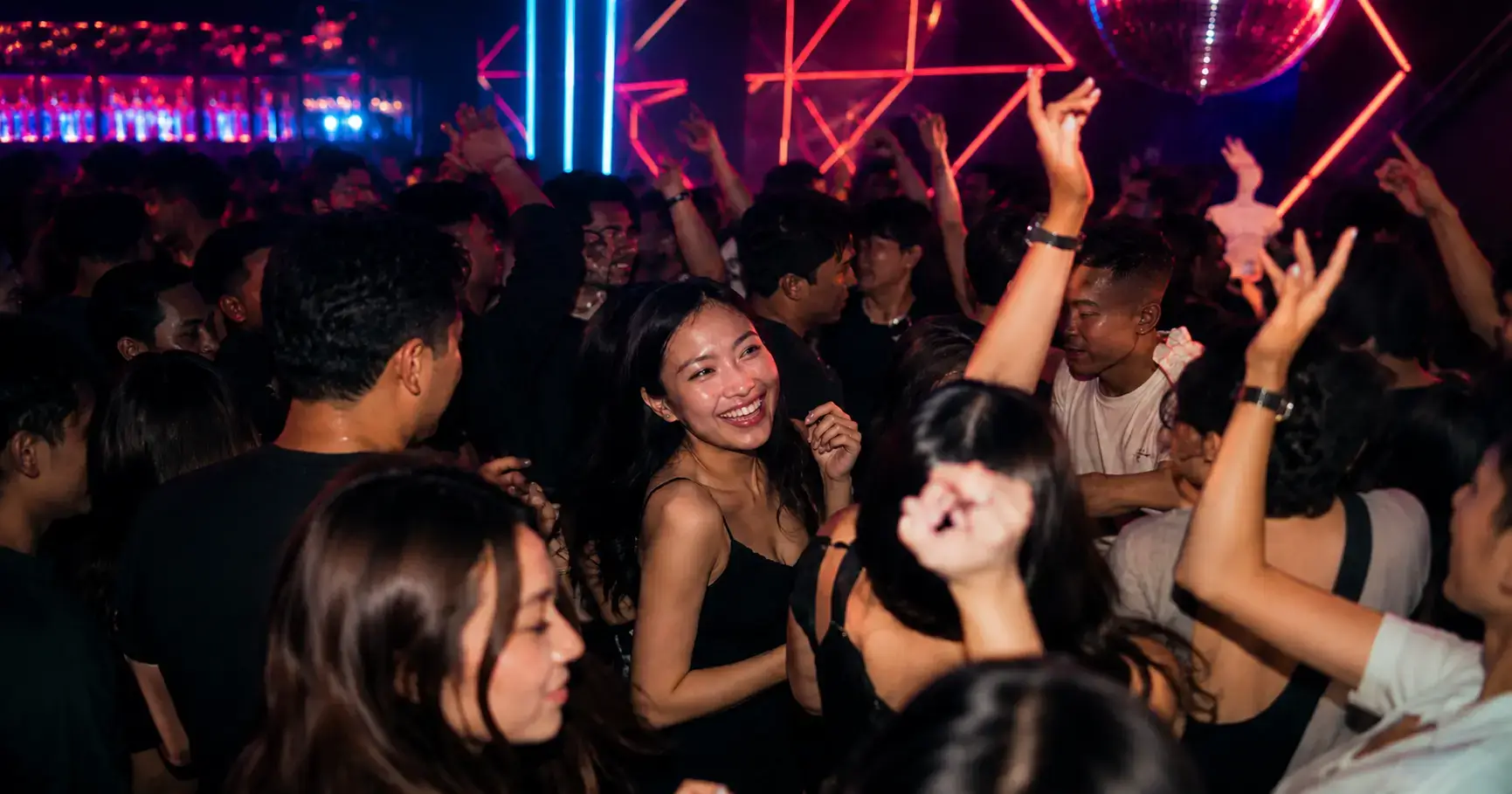Singaporean girl socializing at a club